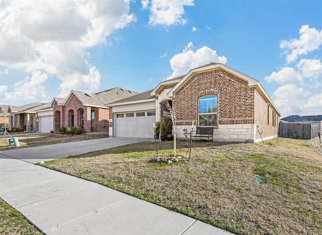 view of front of property with a front lawn and a garage