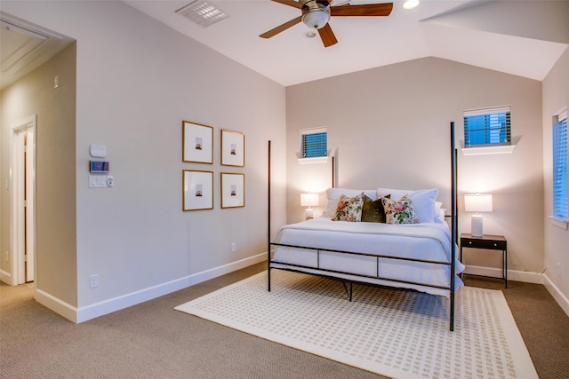 bedroom with carpet floors, vaulted ceiling, and ceiling fan