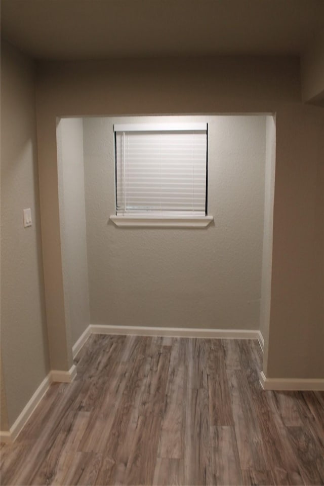 empty room featuring dark hardwood / wood-style floors