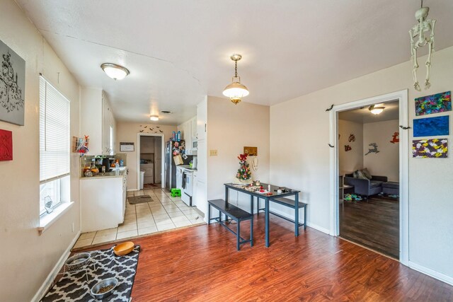 hallway featuring light hardwood / wood-style flooring