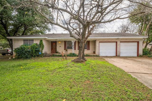 single story home with a garage and a front lawn