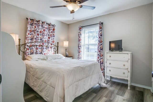 bedroom featuring ceiling fan and wood-type flooring