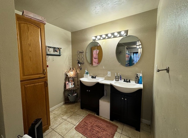 bathroom featuring vanity and tile patterned flooring