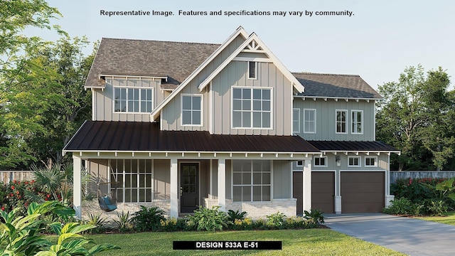 view of front facade featuring a garage and a front lawn