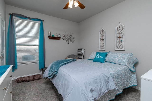 bedroom with ceiling fan and carpet floors