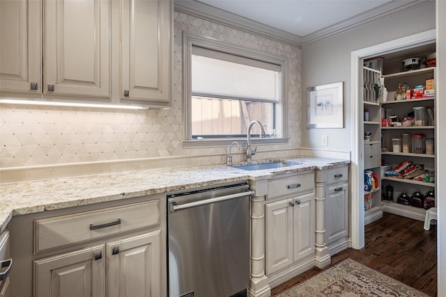 kitchen with dark wood-type flooring, crown molding, sink, stainless steel dishwasher, and light stone counters