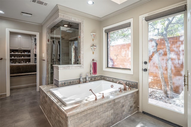 bathroom featuring crown molding and independent shower and bath