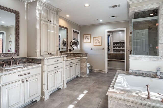 bathroom featuring vanity, separate shower and tub, and ornamental molding