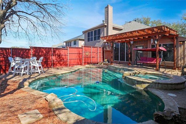 view of swimming pool with a patio area, a fenced backyard, a pool with connected hot tub, and a pergola