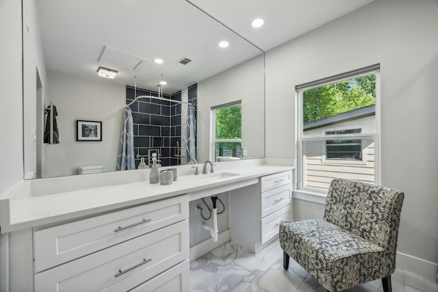 bathroom with a shower with shower curtain, plenty of natural light, toilet, and vanity