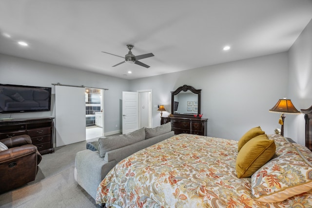 bedroom with light carpet and ceiling fan