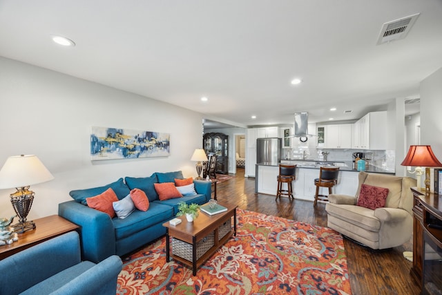 living room with dark wood-type flooring