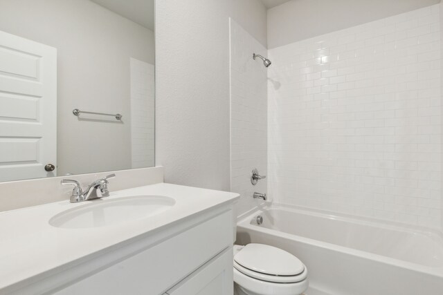 full bathroom featuring vanity, toilet, and tub / shower combination