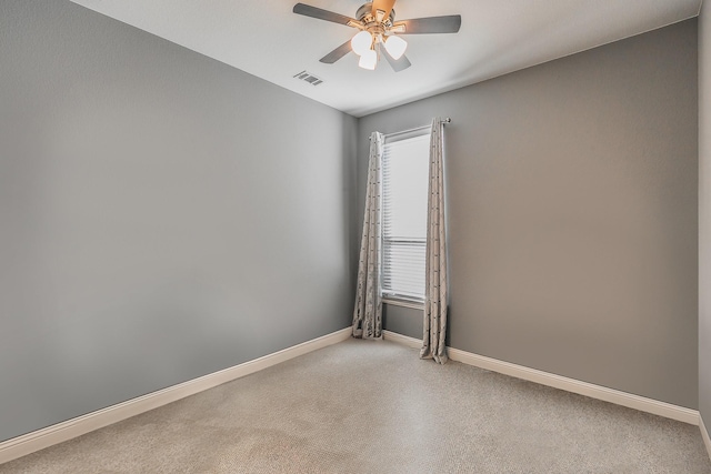 spare room featuring ceiling fan