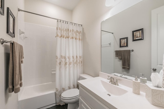 full bathroom featuring vanity, shower / bathtub combination with curtain, and toilet