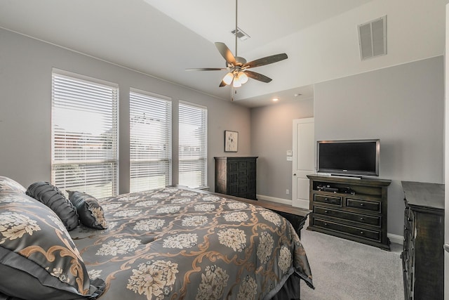 carpeted bedroom with lofted ceiling and ceiling fan