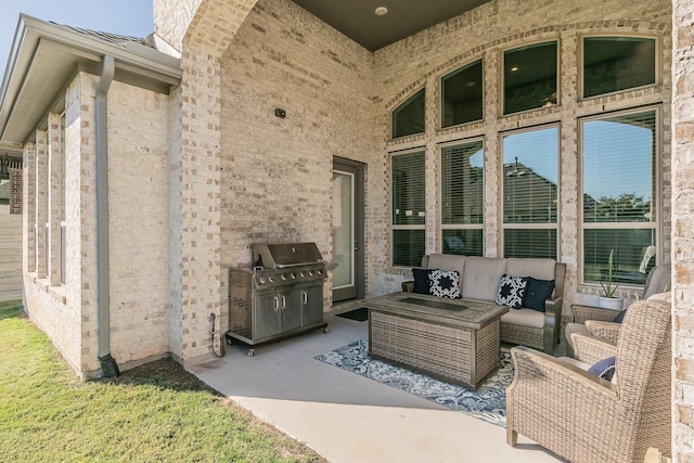 view of patio featuring a grill and outdoor lounge area