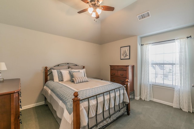 bedroom with ceiling fan, carpet flooring, and vaulted ceiling