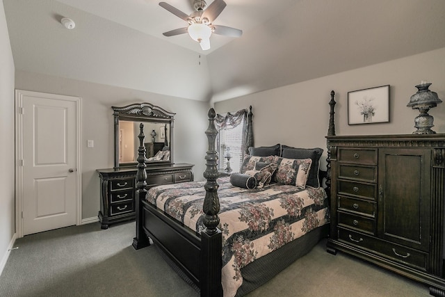 carpeted bedroom with ceiling fan and vaulted ceiling