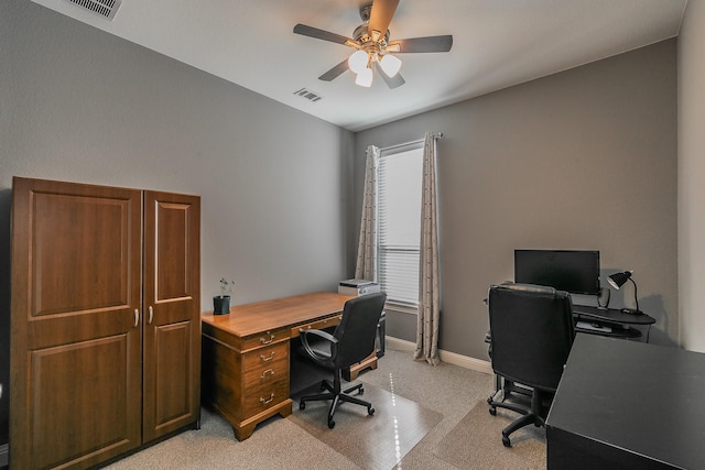 office area featuring ceiling fan and light colored carpet