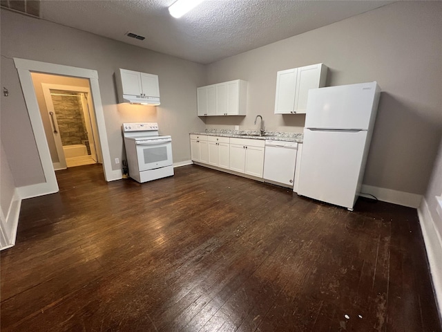 kitchen with white cabinetry, dark wood-type flooring, and white appliances