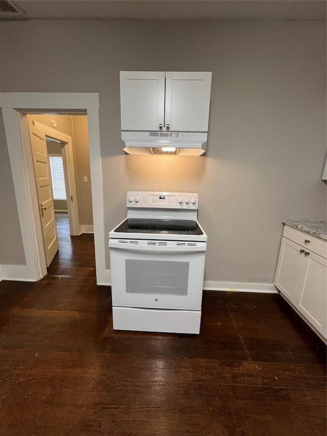 kitchen featuring white cabinetry, dark hardwood / wood-style floors, white electric range oven, and light stone countertops