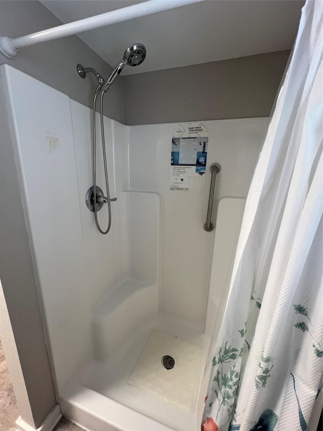 bathroom with walk in shower