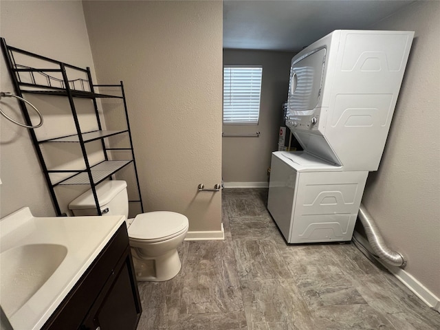 bathroom with vanity, hardwood / wood-style floors, and toilet