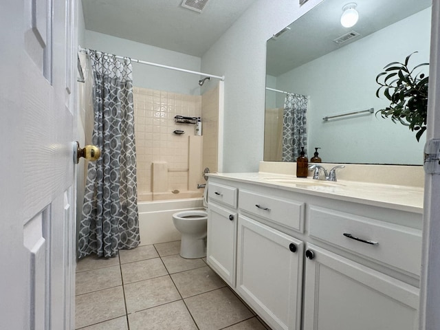 full bathroom with tile patterned floors, shower / bath combo, toilet, and vanity