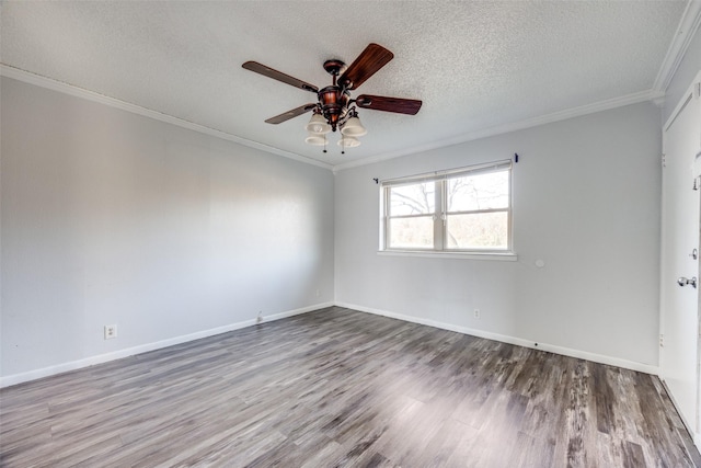 spare room featuring hardwood / wood-style flooring, ceiling fan, crown molding, and a textured ceiling