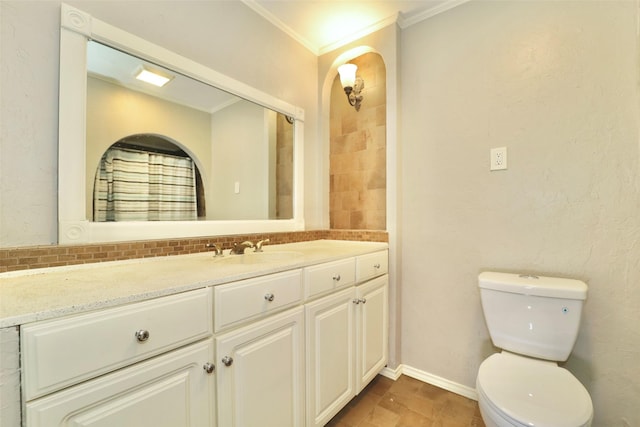 bathroom featuring tasteful backsplash, walk in shower, vanity, crown molding, and toilet