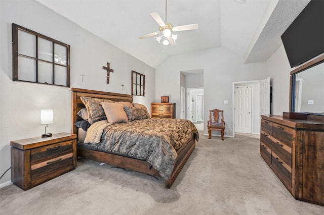 carpeted bedroom featuring ceiling fan and lofted ceiling