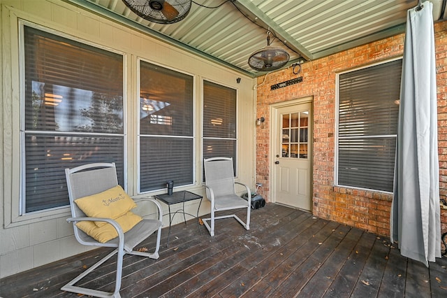 wooden deck with ceiling fan