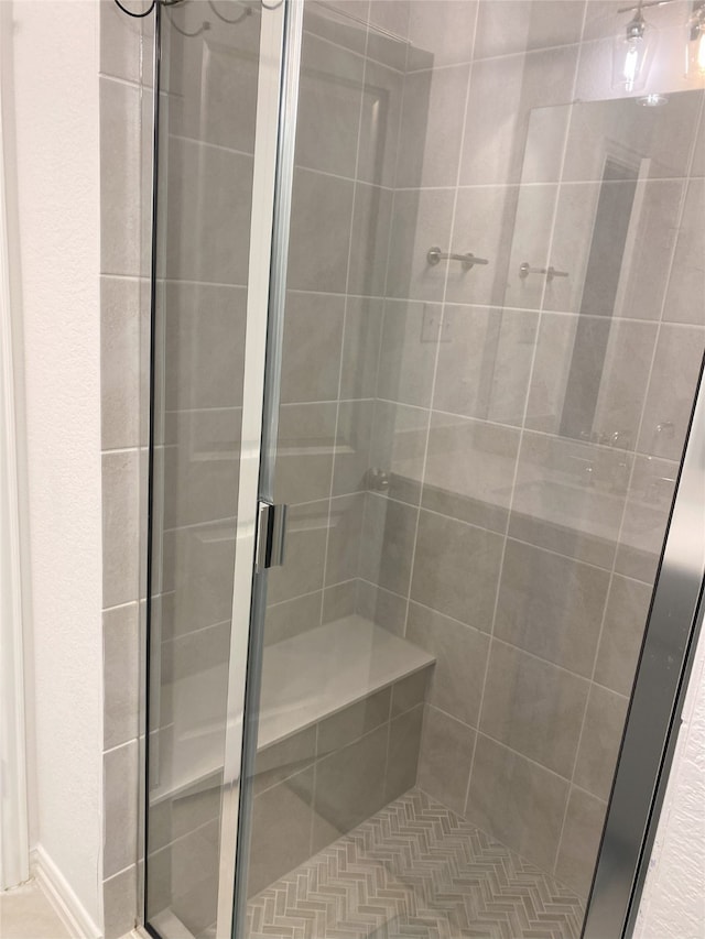 bathroom with an enclosed shower