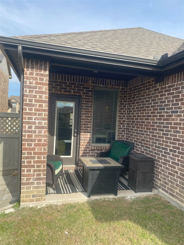 back of house featuring a yard and a patio area