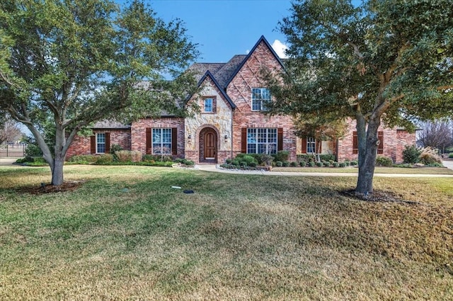 tudor house with a front lawn