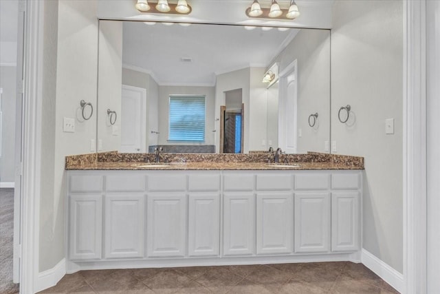 bathroom with tile patterned floors, vanity, and ornamental molding