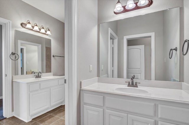 bathroom featuring tile patterned floors and vanity