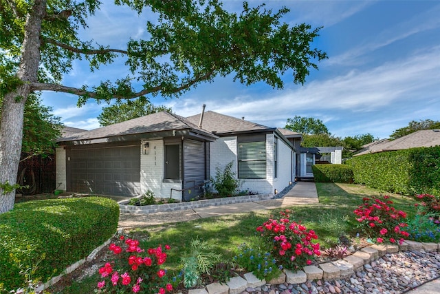 single story home featuring a garage