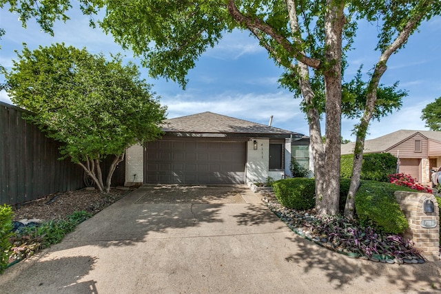 single story home featuring a garage