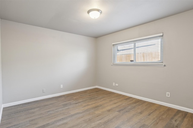 empty room featuring hardwood / wood-style floors