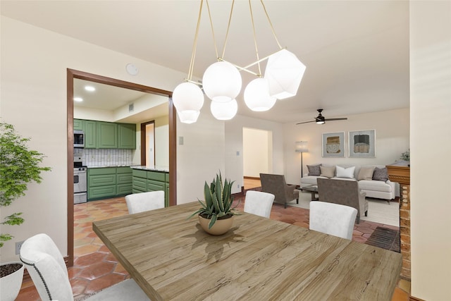 dining space with ceiling fan