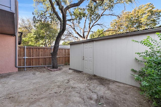 view of patio / terrace with a storage unit