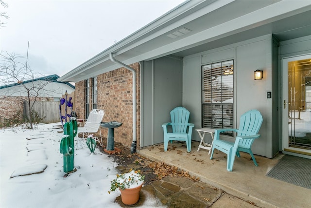 view of snow covered patio