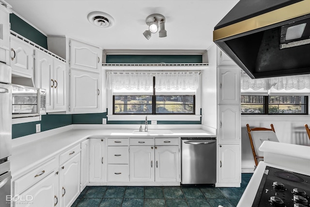 kitchen with ventilation hood, dishwasher, white cabinets, and sink