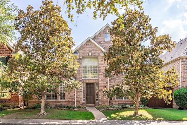 view of front of home with a front yard