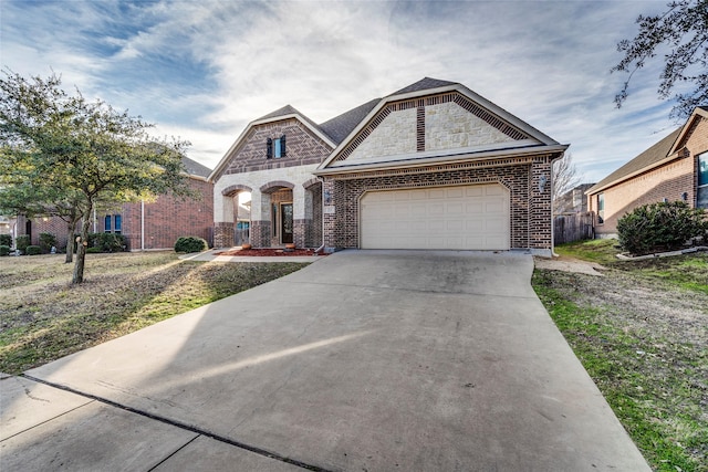 view of front of home with a garage