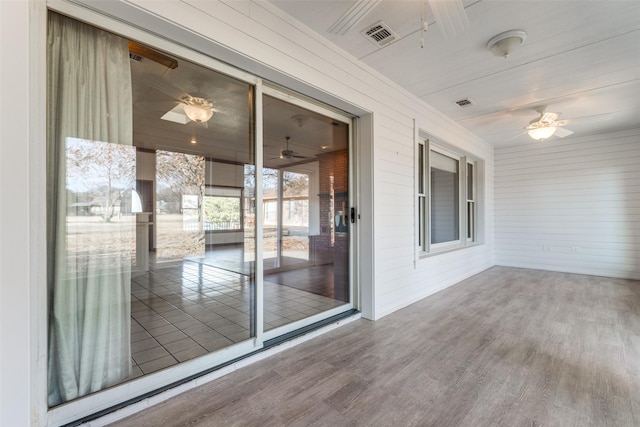 interior space featuring ceiling fan