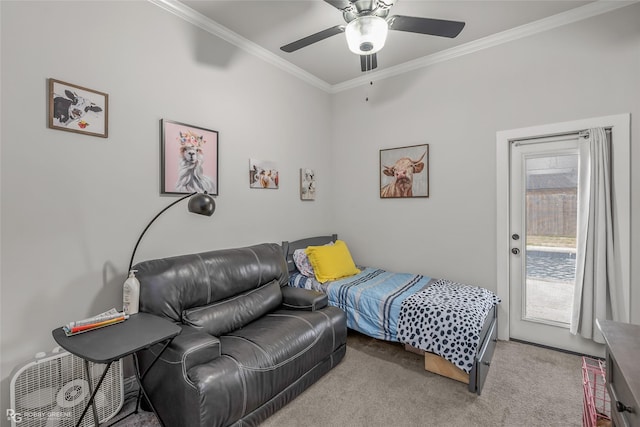 bedroom with ceiling fan, crown molding, and light colored carpet