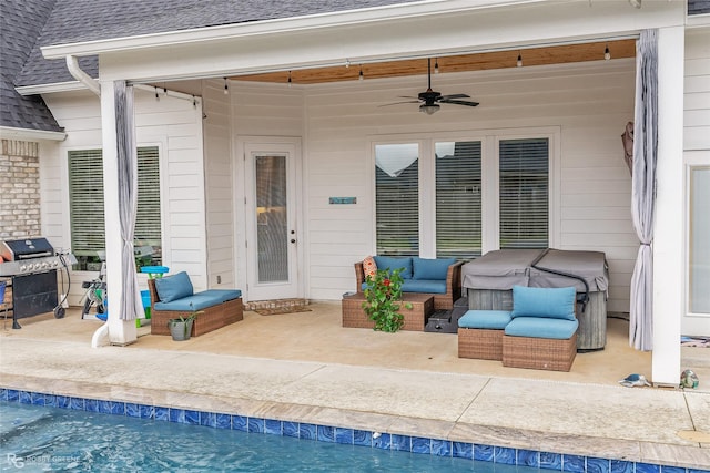 exterior space featuring ceiling fan and grilling area